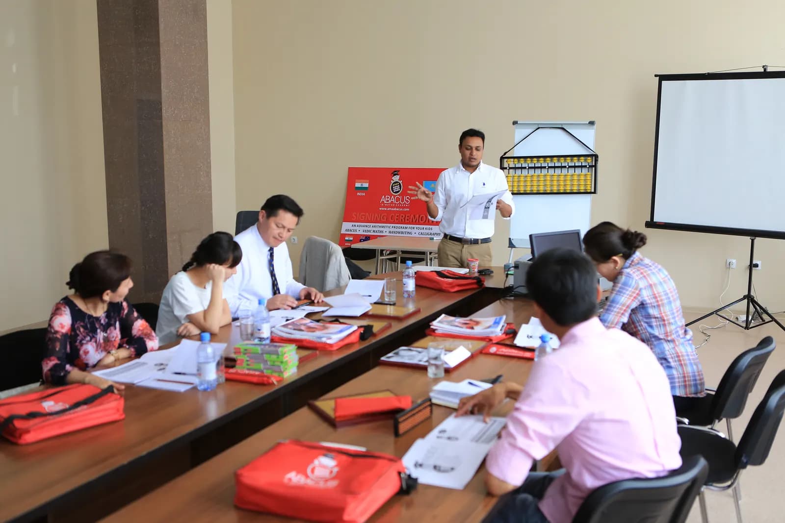 Instructor leading an abacus training session