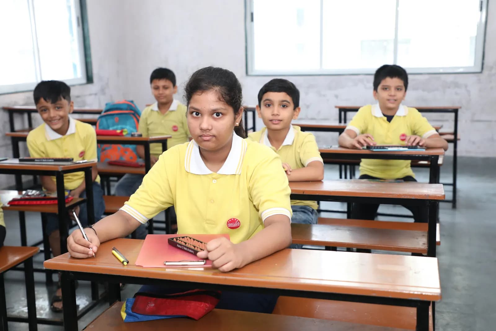 Student using abacus during competitive calculation session